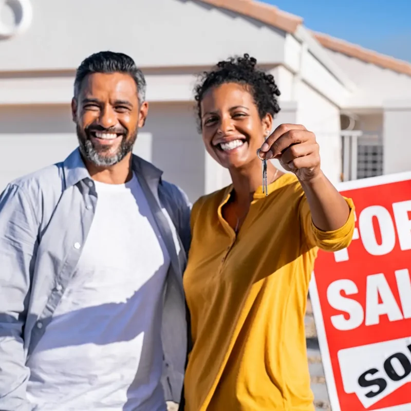 portrait-of-happy-mixed-race-couple-holding-house-2025-10-03-07-17-55-utc